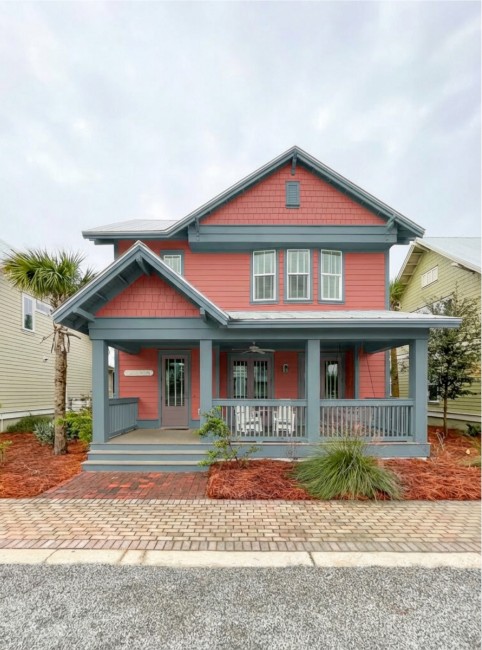 Coastal house after — coral exterior