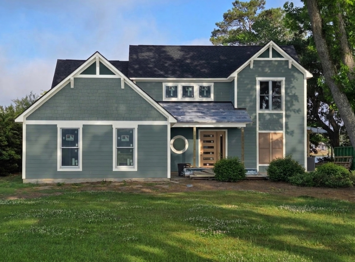 A home repainted in Riverway and Pure White