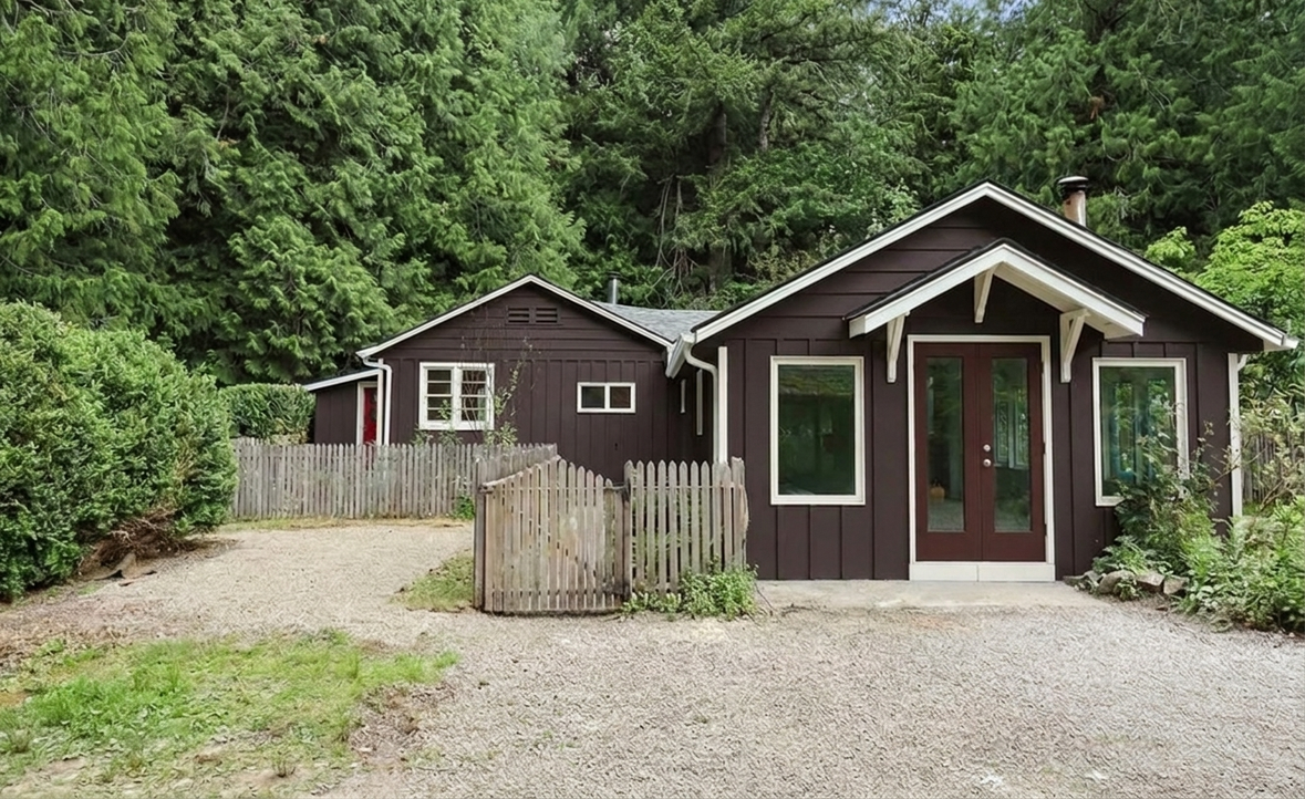 A home repainted in Raisin and Dover White