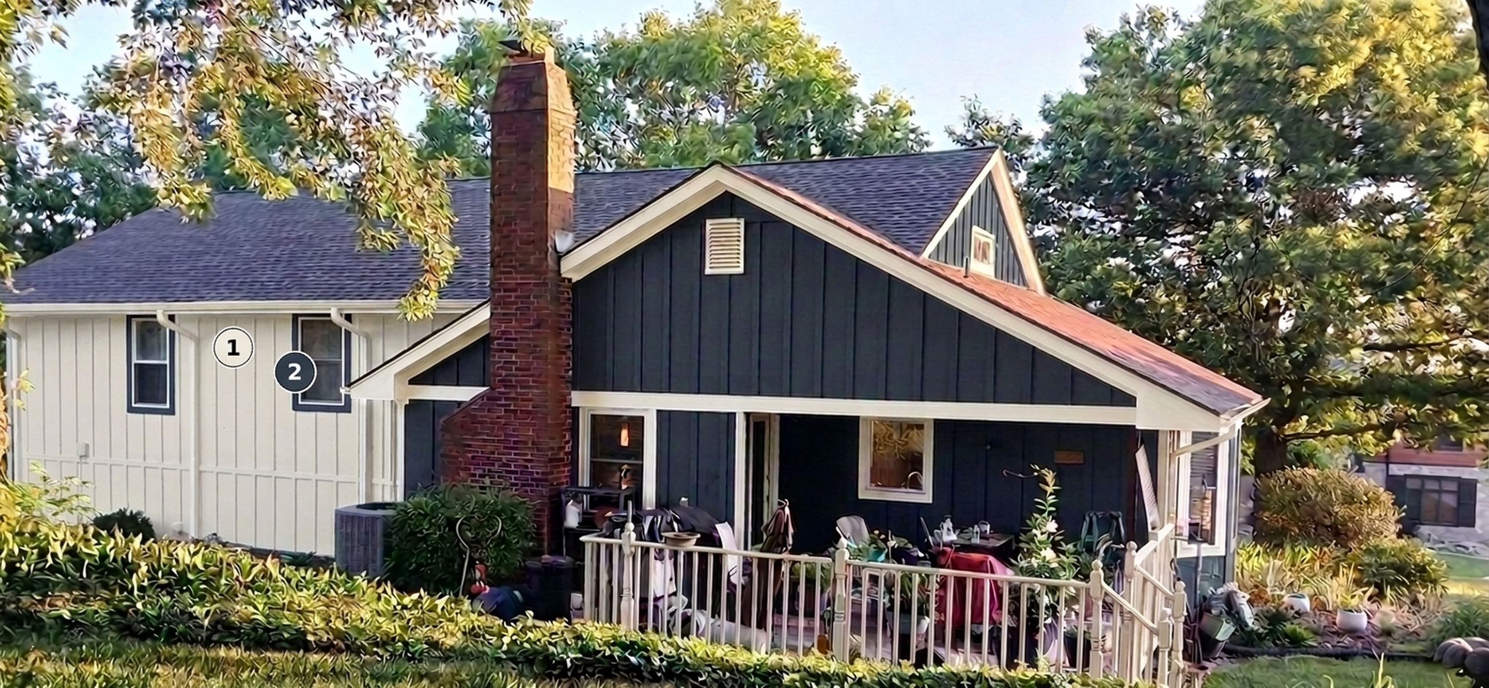 A home repainted in Naval and Alabaster